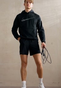 Nike Performance HOODIE - Jersey con capucha - black