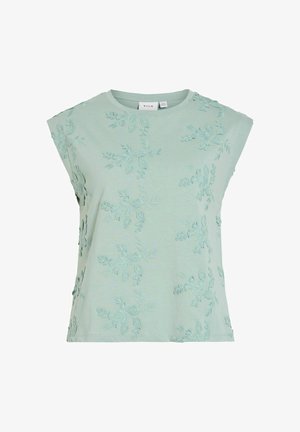 Top fără mâneci de culoare verde deschis, cu decolteu rotund, având modele florale brodate pe față și pe părți.