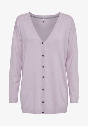 Lilaste žametne jopice z V-izrezom, dolgimi rokavi, črnim gumbom na sprednji strani ter rebrastimi manšetami in robom. Mehka, lahka tekstura.