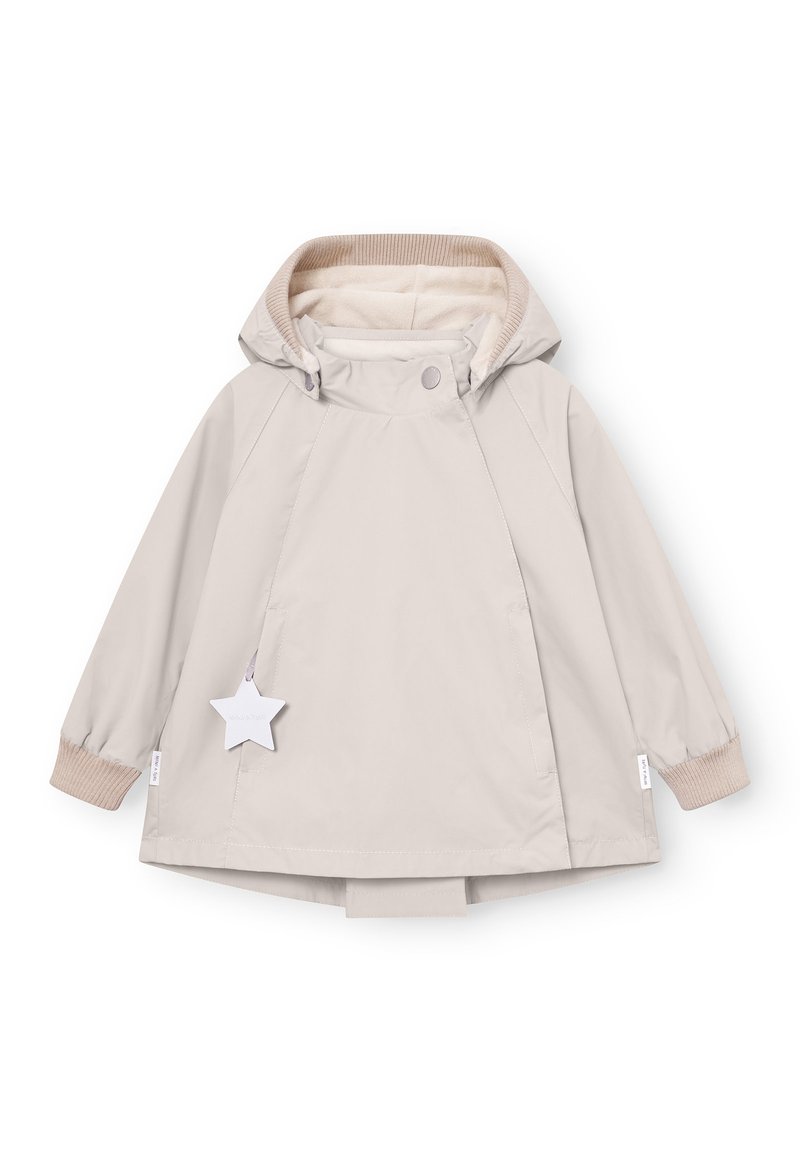 Otroški svetlo bež pulover z rdečim kapuco, z rebrastimi manšetami, zapiranjem na sponke in visečo oznako v obliki zvezde na levi strani.