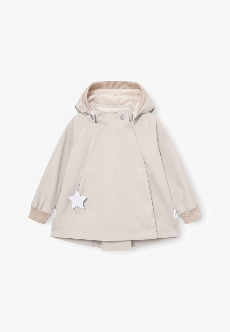 Otroški svetlo bež pulover z rdečim kapuco, z rebrastimi manšetami, zapiranjem na sponke in visečo oznako v obliki zvezde na levi strani.