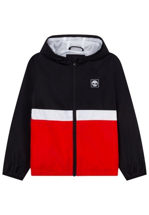 Kurtka z kapturem w blokowe kolory czarny, biały i czerwony, z pełnym zamkiem z przodu i małym logo drzewa na górnej części klatki piersiowej.
