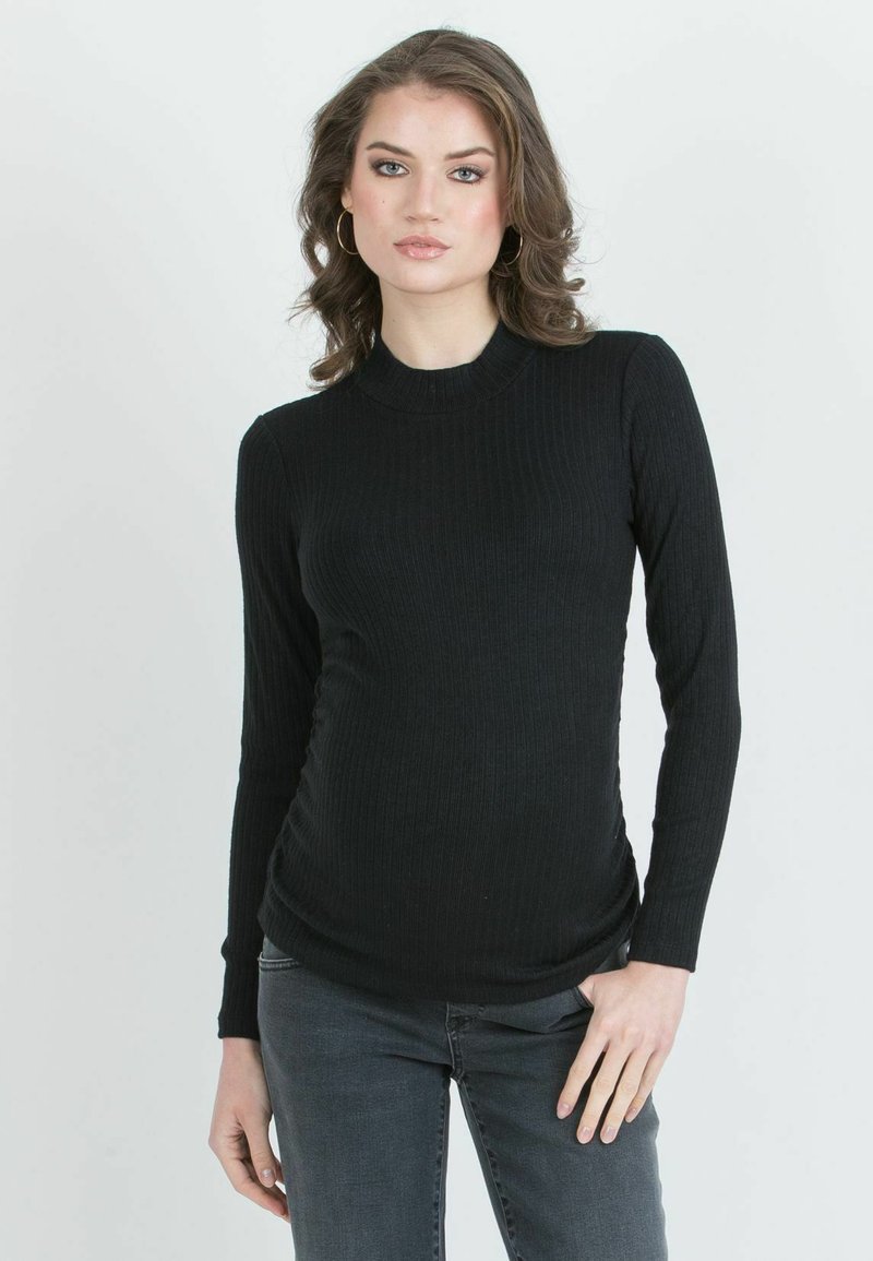 Black ribbed long-sleeve top with a high neckline, featuring a fitted design and side ruching. Fabric has a smooth texture.