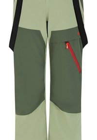 Zelene vanjske hlače od laganog materijala. Imaju zip džep s crvenim detaljima, crne trake i tapered dizajn.