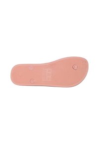 Sole di scarpa in gomma rosa con superficie testurizzata, accenti circolari per la presa e incisioni per informazioni sulla taglia e sul materiale.
