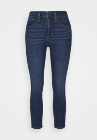 Mörkblå denimjeans med slim fit, hög midja, fem fickor, svag slitning framtill och knäppning med knapp och dragkedja.