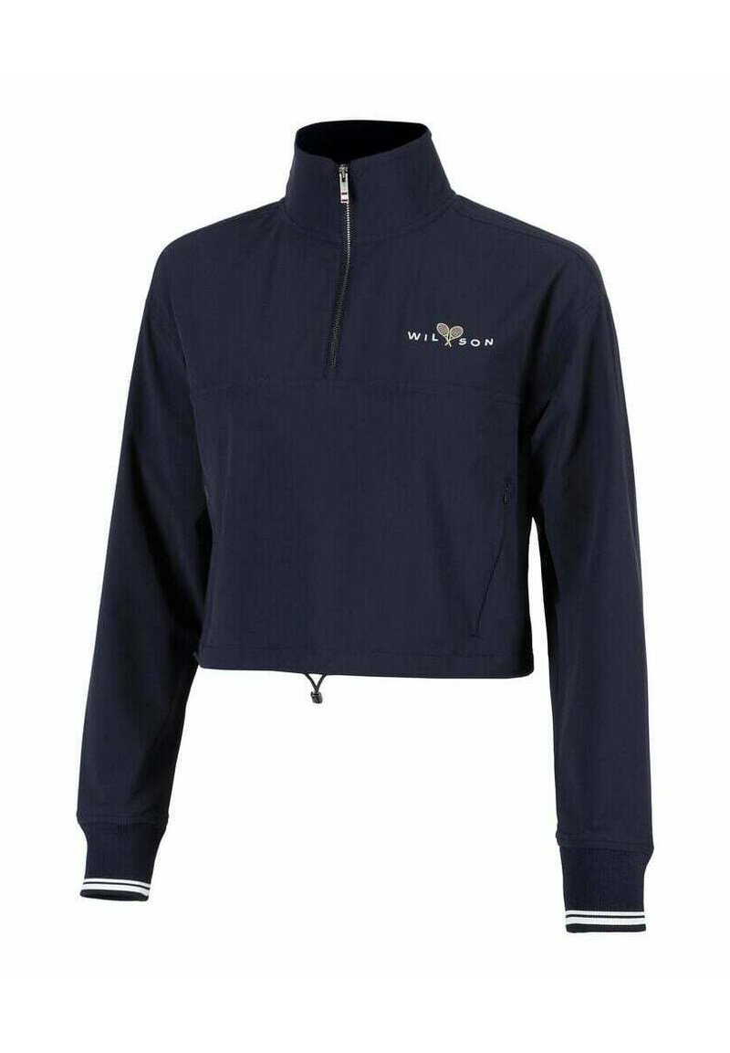 Chaqueta corta de marina con cuello alto, parte delantera con media cremallera, puños elásticos y un logo blanco en el pecho. Hecha de material ligero.