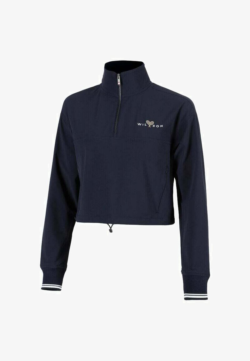 Chaqueta corta de marina con cuello alto, parte delantera con media cremallera, puños elásticos y un logo blanco en el pecho. Hecha de material ligero.