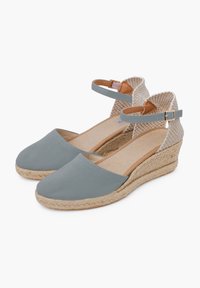 Šedé plátěné espadrilky na klínu s kotníkovým páskem, jutovou podrážkou a tkanými ozdobami. Polstrovaná stélka, design s kulatou špičkou.