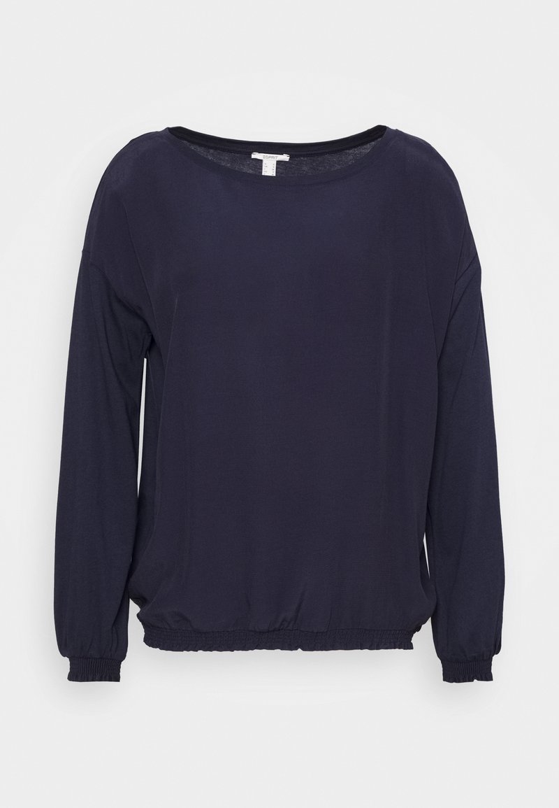 Långärmad marinblå skjorta med elastiska ärmslut och fåll, rund halsringning, visad på en ren vit bakgrund.