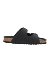 Svart slide-sandal med korksoffa, med två justerbara remmar och utskärningsdesign. Slät gummimaterial med strukturert fotbed.