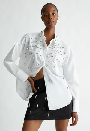 WITH RHINESTONES - Blus - white