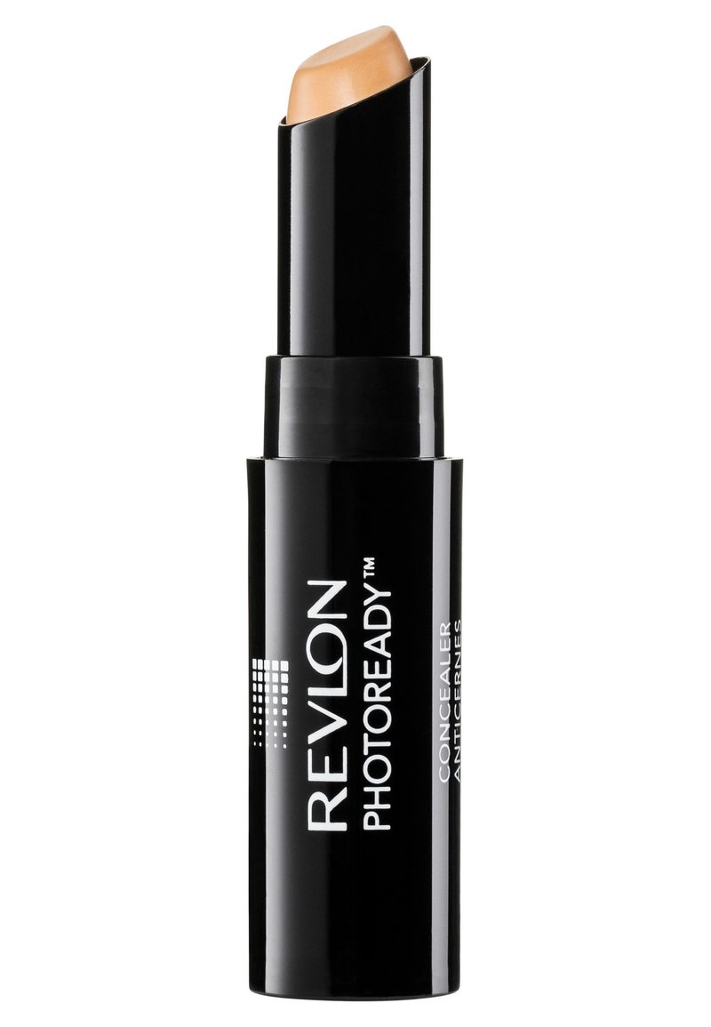 Revlon Photoready Concealer in einem schwarzen Drehstift, mit einer glatten, hautfarbigen Stiftspitze und in Weiß bedrucktem Logo.