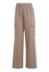 Bruna cargobyxor i mjukt tyg, med lös passform, två sidofickor och vita randiga detaljer längs sidorna.