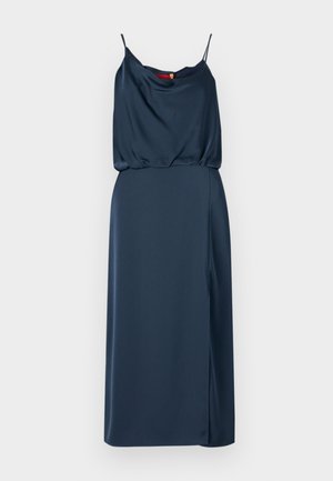 Satin navy blue dress with thin straps, a draped bodice, and a side slit. Smooth texture, fitted silhouette, and a subtle sheen.
