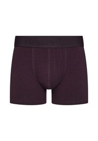 Donkere paarse herenslip met een zachte stof, voorzien van een zwarte elastische tailleband met daarop het opgedrukte merkteken en een strakke pasvorm.