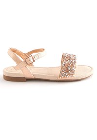 Sandal in rosa pallido con cinturino glitterato color rosé. Materiale morbido simile al camoscio, suola piatta, fibbia regolabile e design casual.