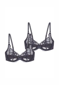 Tummansininen pitsi rintaliivi, jossa on läpinäkyviä yksityiskohtia, tuki alahaalareilla, säädettävät olkaimet ja keskellä koristeellinen nauha. Kahden tuotteen setti.