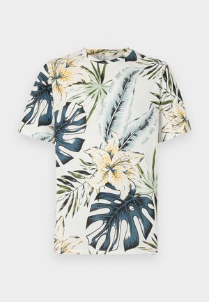 Lühikeste varukatega t-särk heas kvaliteedis kangas, millel on troopiline lillede ja lehtede muster rohelises, sinises ja kollases kreemja tausta peal.