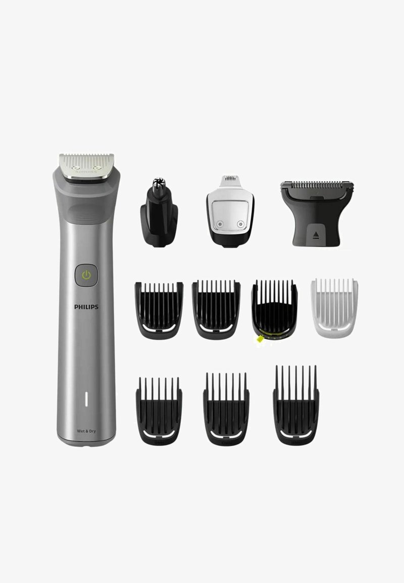 Philips grooming kit includes a metallic silver trimmer with various black and white attachment combs and a nose hair trimmer.