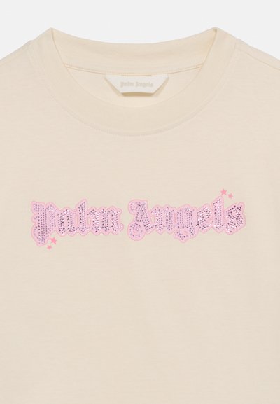 Kremowy t-shirt z różowym logo "Palm Angels" wysadzanym kryształkami i małymi gwiazdkami na piersi.