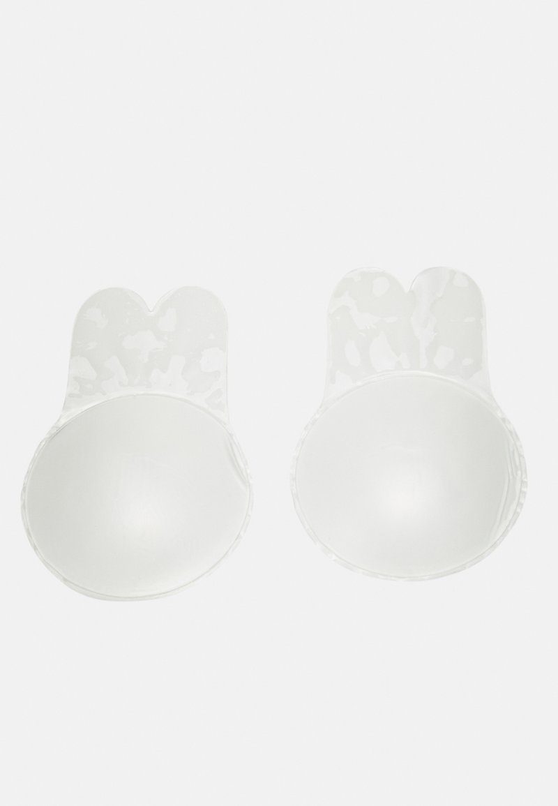 Cups de soutien-gorge en silicone transparent avec un sommet en forme de cœur, présentant une surface lisse et une forme arrondie conçues pour un soutien discret.