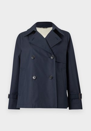 Navy double-breasted jacket with wide lapels, button details, side pockets, and adjustable strap cuffs.
