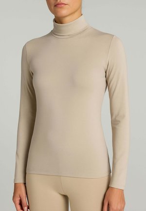 Maglione beige a maniche lunghe con colletto alto, realizzato in tessuto liscio ed elasticizzato, caratterizzato da un design aderente. Cuciture decorative lungo i bordi.
