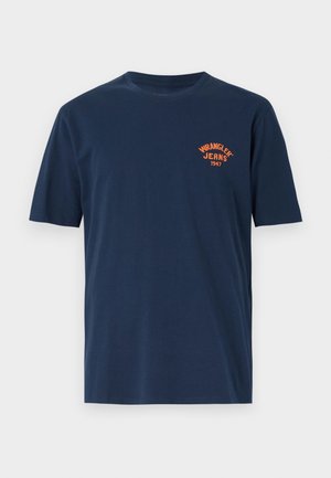 Navy blue cotton t-shirt featuring short sleeves, a crew neck, and an orange embroidered "Wrangler Jeans 1947" logo on the chest.