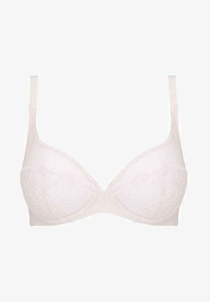 Beige bra with lace detailing, wired cups, adjustable straps, and smooth texture. Features decorative patterns on cups and a secure band.
