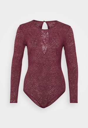 Bodysuit i djup bourgogne spets med ett texturerat blommönster, långa ärmar och en nyckelhålsdetalj bak. Mjuk, elastisk material.
