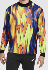 Koszulka sportowa z długim rękawem, ozdobiona żywym, abstrakcyjnym wzorem w kolorach żółtym, pomarańczowym, niebieskim i czarnym. Wykonana z lekkiego, teksturowanego materiału.