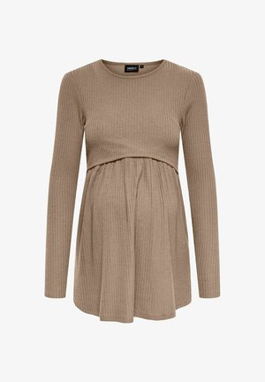 Top premamá de manga larga con textura acanalada en beige, con un cuerpo ajustado y parte inferior acampanada, que presenta un escote redondo y una tela suave y texturizada.