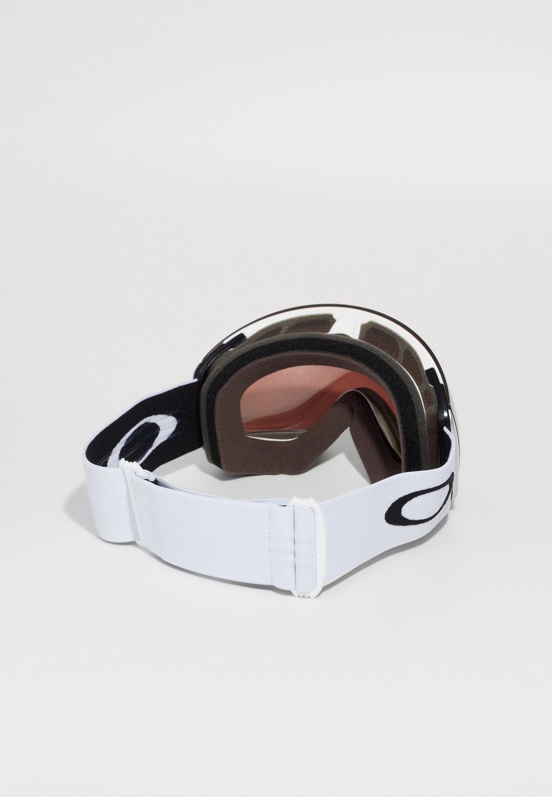 Skibrille mit einem weißen elastischen Band, schwarzen Akzenten, braunem Schaumstoffpolster und einer getönten Linse mit metallischer Beschichtung.