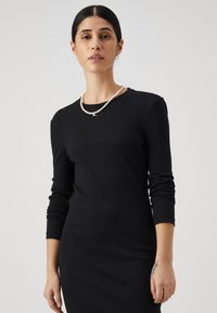Vero Moda Petite VMLAVENDER O NECK DRESS - Trikoomekko - black