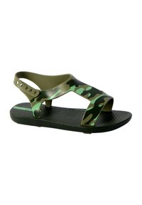 Green and black camo sandals with cross straps and a textured sole, made from flexible material; features a back strap and button accents.