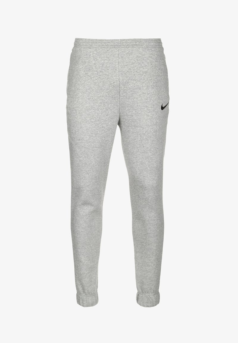 Pantalones de chándal grises hechos de tejido suave, con una cinturilla elástica, puños acanalados y un pequeño logo negro de Nike en el muslo izquierdo.