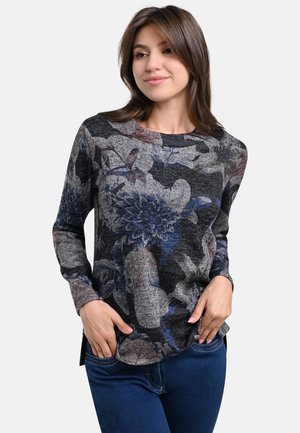 Langärmliges Blumenoberteil mit einem grauen und schwarzen Muster sowie blauen Akzenten, aus einem weichen, strukturierten Stoff gefertigt. Rundhalsausschnitt und abgerundetem Saum.