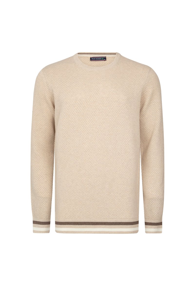 Maglione lavorato a maglia beige chiaro con una texture a nido d'ape, collo rotondo e polsini a strisce marroni e bianche in contrasto sul fondo.