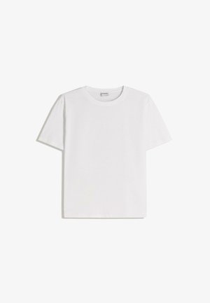 Hvid bomuld T-shirt med rund halsudskæring og korte ærmer. Har en klassisk, firkantet form uden synlige mønstre eller detaljer.