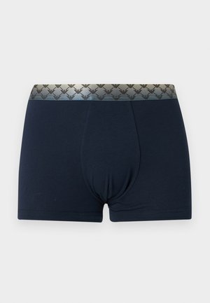 Boxers pour hommes bleu marine avec une ceinture élastique argentée comportant un motif répétitif de logo aigle.
