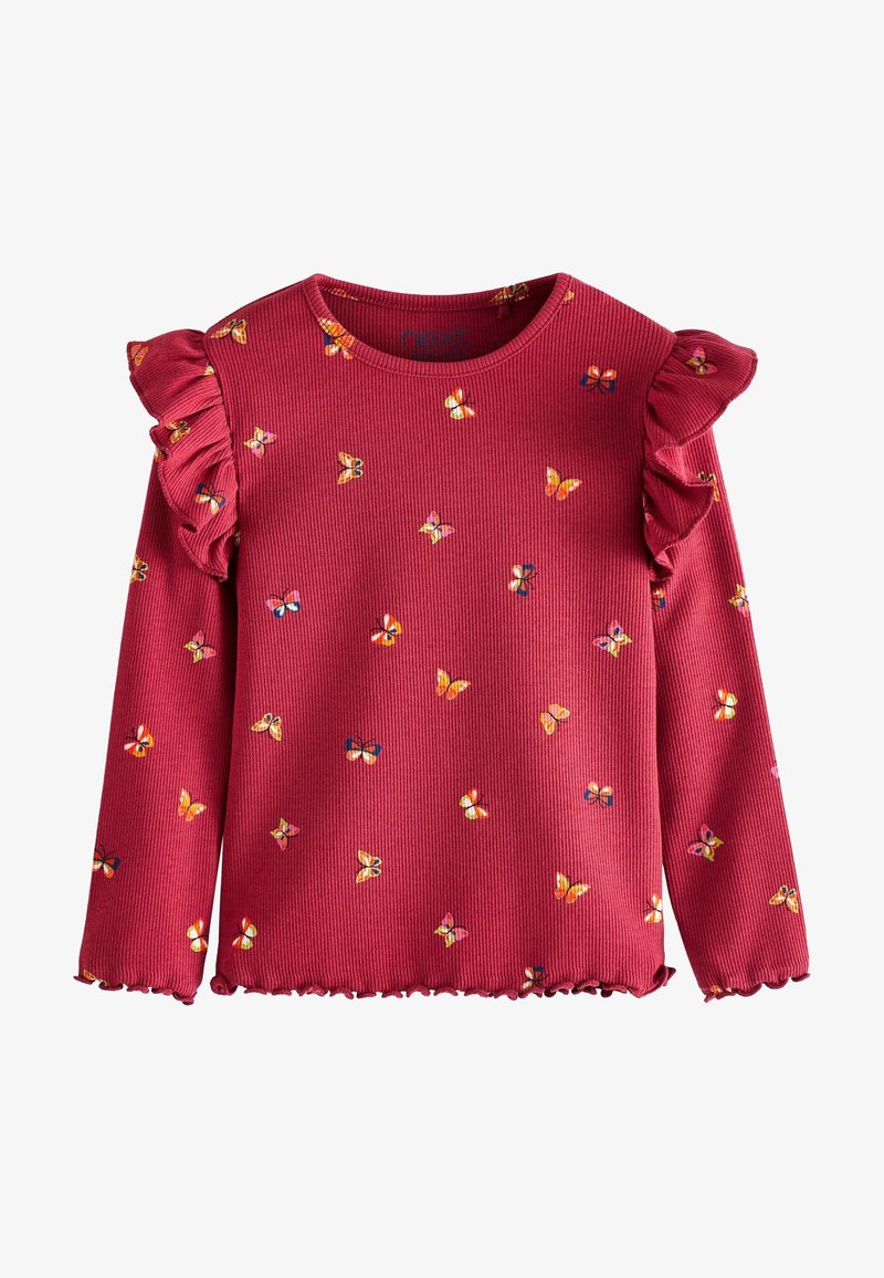 Haut à manches longues côtelé de couleur rose foncé avec des épaules volantées et de petites imprimés papillons orange et jaunes éparpillés.