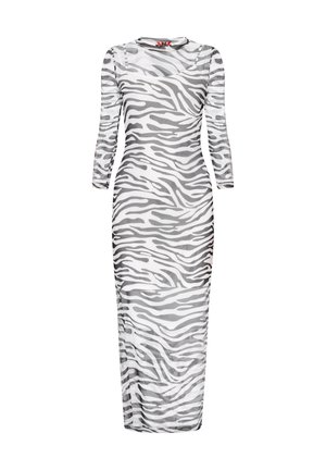 Lang, nauwsluitend jurkje van doorzichtig materiaal met een zwart-wit zebra print, voorzien van lange mouwen en een ronde halslijn.