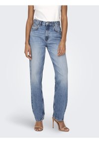 Jeans de tiro alto en azul con corte recto, presentan un lavado desgastado, diseño clásico de cinco bolsillos y pase de cinturón.