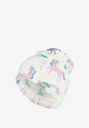 White baby hat with pink and purple unicorns, rainbows, clouds, and hearts, featuring a small fabric label with brand name.