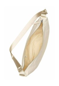 Sac en bandoulière de couleur crème avec une large sangle réglable et une fermeture éclair partiellement ouverte révélant un intérieur doublé en tissu beige.