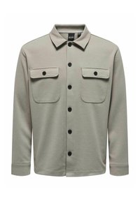 Light gray shirt jacket made from textured fabric, featuring a collar, two chest pockets, and black buttons down the front.