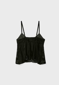 Schwarzes Hemdchen aus weichem Stoff mit verstellbaren Trägern, verfügt über ein fließendes Design, dekorative Nähte und geometrische Akzente an den Seiten.