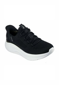 Scarpa sportiva nera con tomaia in rete, design senza lacci e accenti testurizzati. Presenta una suola bianca imbottita per un maggiore comfort.