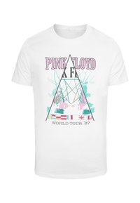 T-shirt en coton blanc avec un graphique coloré représentant un triangle. Le texte inclut "PINK FLOYD" et "WORLD TOUR '87" en rose et noir.